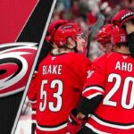 Why the Carolina Hurricanes are NHL’s Top Team to Watch for a Blockbuster Trade dynamic in-game action shot of the Carolina Hurricanes skating on home ice, representing their aggressive team strategy.