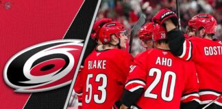 dynamic in-game action shot of the Carolina Hurricanes skating on home ice, representing their aggressive team strategy.