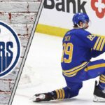 Is Alex Tuch the Missing Piece for a Stanley Cup Run in Edmonton? Don’t Get Your Hopes Up Alex Tuch celebrating a goal with the Edmonton Oilers logo to the left signifying the NHL trade rumor