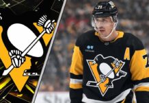 Evgeni Malkin, Pittsburgh Penguins center, skates with the puck during a power play, anticipating a pass to Sidney Crosby or Erik Karlsson.