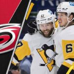 Carolina Hurricanes logo to the left and Pittsburgh Penguins forward Bryan Rust and Rickard Rakell celebrating a goal, implying a potential NHL trade rumors.