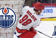 Jack Roslovic’s Rejection of the Edmonton Oilers: A Gamble Gone Wrong? Jack Roslovic taking a shot on net and wondering why he did not sign with the Edmonton Oilers?