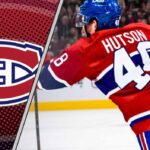 Lane Hutson, Montreal Canadiens defenseman, celebrates after signing his 8-year contract.