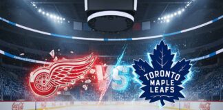A widescreen promotional image for a hockey game between the Detroit Red Wings and the Toronto Maple Leafs. At center ice of the Maple Leafs' home arena, the stylized, glowing red logo of the Red Wings collides with the glowing blue logo of the Leafs, with the word 'VS' between them.