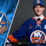 New York Islanders rookie defenseman Matthew Schaefer posing for a picture