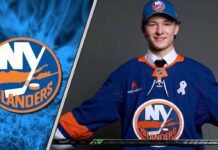 New York Islanders rookie defenseman Matthew Schaefer posing for a picture