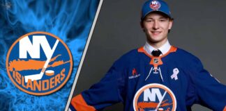 New York Islanders rookie defenseman Matthew Schaefer posing for a picture