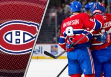 Montreal Canadiens defenseman Mike Matheson skating with the puck during an NHL game, looking focused and determined.