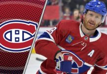 Montreal Canadiens defenseman Mike Matheson skates with the puck during a game, looking to start the breakout as he leads the defense corps.