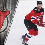 Dougie Hamilton Trade Rumors: Why the New Jersey Devils Are Standing Pat (For Now) New Jersey Devils defenseman Dougie Hamilton skates with the puck, looking up ice during an NHL game, illustrating the NHL trade rumors discussion.