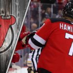 An image of New Jersey Devils defensemen Dougie Hamilton on the ice, representing the team's salary cap challenges.
