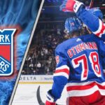 Why a Brennan Othmann Trade is Becoming an Inevitability for the New York Rangers New York Rangers forward Brennan Othmann celebrates during an NHL game, amidst NHL trade rumors