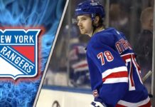 New York Rangers prospect Brennan Othmann skates during his recall, facing an uncertain future amid NHL trade rumors.