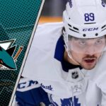 Nick Robertson to the San Jose Sharks: A Perfect Match? Toronto Maple Leafs forward Nick Robertson skates with the puck during an NHL game.