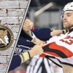 Ottawa Senators defenseman Kurtis MacDermid in a fight during an NHL game.