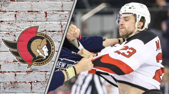 Ottawa Senators defenseman Kurtis MacDermid in a fight during an NHL game.