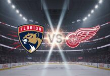 An exciting visual of the Florida Panthers logo and the Detroit Red Wings logo clashing with a "VS" in the middle, set against the backdrop of a spotlight-illuminated hockey arena with Coca-Cola logos visible on the rink boards.