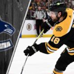 Boston Bruins forward Pavel Zacha skates during an NHL game, with Vancouver Canucks trade interest swirling.