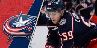 Columbus Blue Jackets forward Yegor Chinakhov skates during an NHL game, looking for a pass amidst NHL trade rumors.