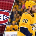 Ryan O'Reilly getting ready for a faceoff as Montreal Canadiens scouts look on