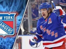 New York Rangers forward Artemi Panarin skating with the puck during an NHL game, amid KHL trade rumors.