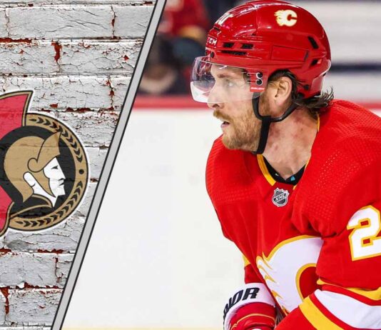 Calgary Flames winger Blake Coleman skating during a game, potential Ottawa Senators trade target.