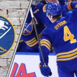 Buffalo Sabres defenseman Bowen Byram celebrates a goal during an NHL game, representing a key trade target.