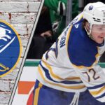 Buffalo Sabres forward Tage Thompson skating during an NHL game, looking focused as NHL trade rumors circulate.