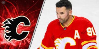 The Kadri Conundrum: Why the Struggling Calgary Flames Are Being Forced to Trade Their Best Player Flames center Nazem Kadri skates with the puck, looking to make a play in the offensive zone.