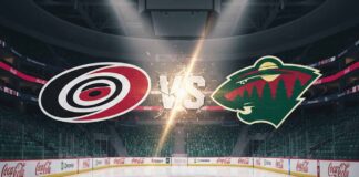 A widescreen image showing the Carolina Hurricanes logo on the left and the Minnesota Wild logo on the right, with "VS" stylized between them, all superimposed over a blurred background of an ice hockey arena with bright spotlights.