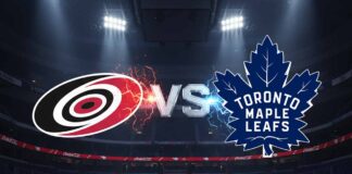 A stylized image showing the Carolina Hurricanes logo and the Toronto Maple Leafs logo colliding, with "Vs" between them. The background is an illuminated hockey arena interior with Coca-Cola logos on the boards.