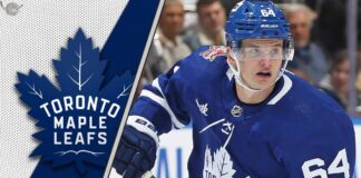 Is David Kampf’s Time as a Maple Leaf Over? Toronto Maple Leafs center David Kampf skates during an NHL game, looking on intently.