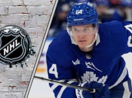 The Kampf-ather: Why 4 Teams Are Scrambling to Sign the Ex-Maple Leafs Center David Kampf in his Toronto Maple Leafs jersey, looking on intently as he skates, representing his free agency.