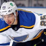 Jordan Kyrou to Detroit? Analyzing the Rumor Dividing Blues & Red Wings Fans St. Louis Blues forward Jordan Kyrou skates during a game, looking frustrated, symbolizing NHL trade rumors.