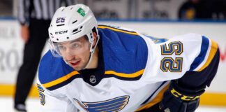 Jordan Kyrou to Detroit? Analyzing the Rumor Dividing Blues & Red Wings Fans St. Louis Blues forward Jordan Kyrou skates during a game, looking frustrated, symbolizing NHL trade rumors.