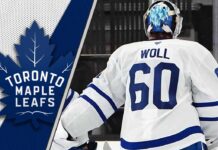 Joseph Woll of the Toronto Maple Leafs looking focused in net, subject of latest NHL trade rumors regarding a 2026 first-round draft pick.