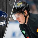 Why the Vancouver Canucks Are Already Giving Up on Lukas Reichel Lukas Reichel skating for the Vancouver Canucks during an NHL game amidst NHL trade rumors