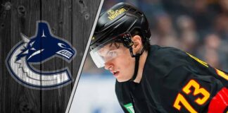 Lukas Reichel skating for the Vancouver Canucks during an NHL game amidst NHL trade rumors