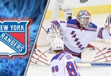 New York Rangers goalie Igor Shesterkin making a glove save, symbolizing the team's renewed defensive structure under Mike Sullivan.