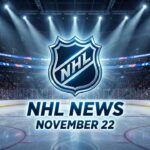 Stylized NHL shield logo with "NHL NEWS" and "NOVEMBER 22" text below it, illuminated by spotlights on a professional hockey rink in a packed arena.