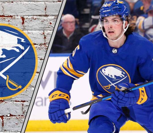 Buffalo Sabres defenseman Owen Power skating with the puck, analyzing trade rumors and defensive performance.