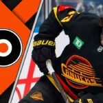 Philadelphia Flyers trade rumors graphic featuring Vancouver Canucks defenseman Quinn Hughes and Flyers logo to the left