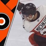 Philadelphia Flyers forward Matvei Michkov taking a shot on goal