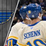 The Note Has Soured: Why the St. Louis Blues Are Gearing Up to Trade Captain Brayden Schenn St. Louis Blues captain Brayden Schenn skating in his blue jersey, looking on as NHL trade rumors intensify.