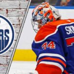 Edmonton Oilers goaltender Stuart Skinner looking focused in his crease during an NHL game at Rogers Place.