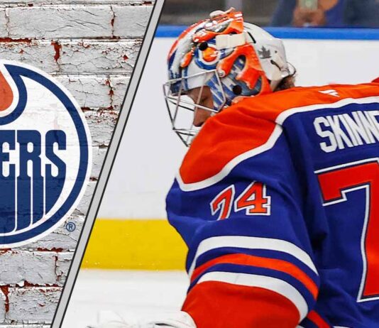 Edmonton Oilers goaltender Stuart Skinner looking focused in his crease during an NHL game at Rogers Place.