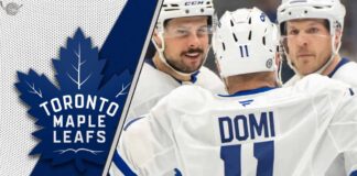 Are the Toronto Maple Leafs Stuck? Friedman Reveals “Roster for Roster” Trade Plan That Spells Trouble An intense-looking Toronto Maple Leafs player Max Domi skating during an NHL game, representing a potential trade chip.