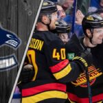 Vancouver Canucks celebrating a goal as NHL trade rumors swirl around the team
