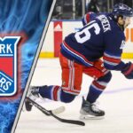 New York Rangers center Vincent Trocheck skates during an NHL game, with a superimposed Montreal Canadiens logo indicating a NHL trade rumor.