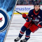 Winnipeg Jets prospect Brad Lambert skating during warmups, subject of recent NHL trade rumors and speculation involving Kevin Cheveldayoff.